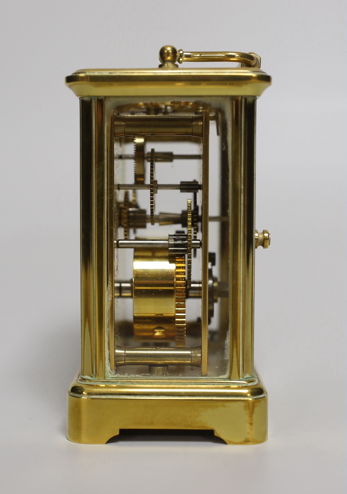 A brass eight day carriage timepiece, retailed by Comitti of London, 12cm high